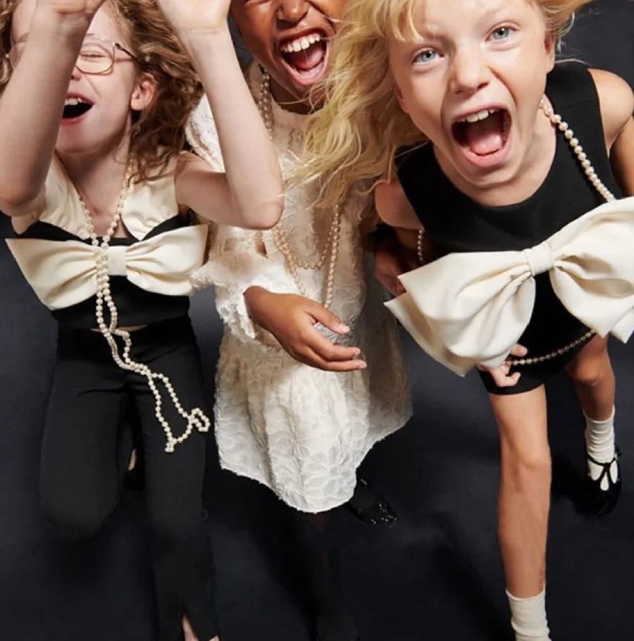 Vestido increíble de fiesta para niña, sin mangas, color negro con lazo blanco, para matrimonio, desfile, cumpleaños