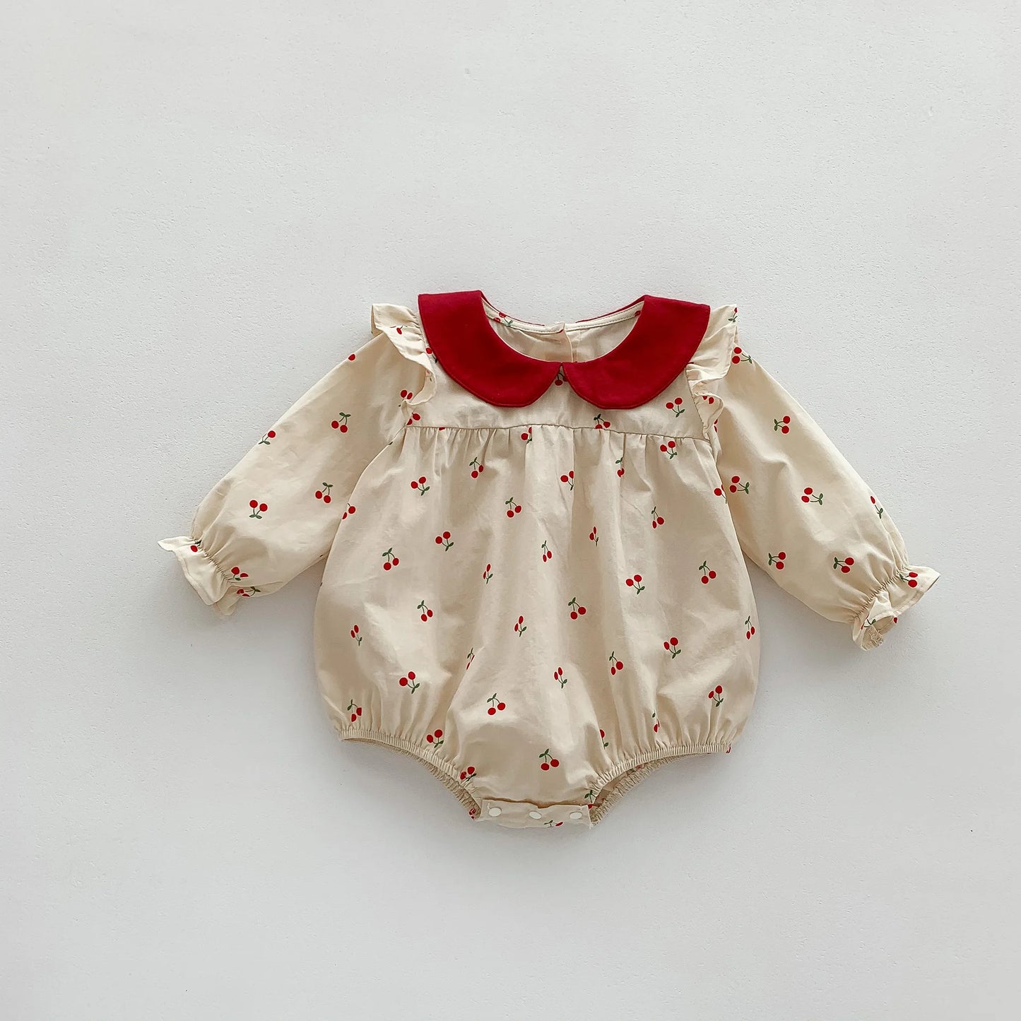 Precioso bombacho Vintage para bebé niña, enterito con cuello Peter Pan y estampado de cerezas para niñas pequeñas, Outfit de otoño invierno y de primavera verano para niñas