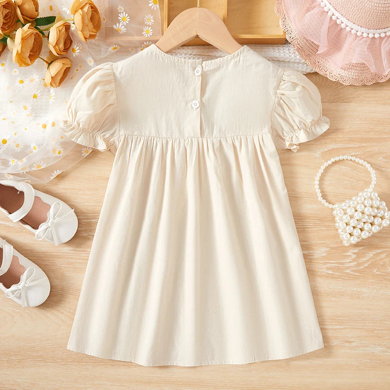 Vestido de verano para niñas, blanco crudo bordado con colores campestres de manga corta globito, perfecto para esta primavera y verano y verse...irresistible!