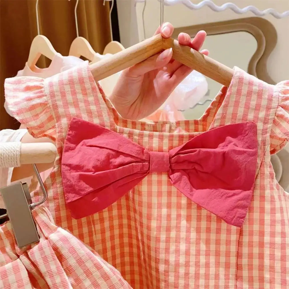 Trending! Conjunto de dos piezas de verano para niña, a cuadros roja con lazo.