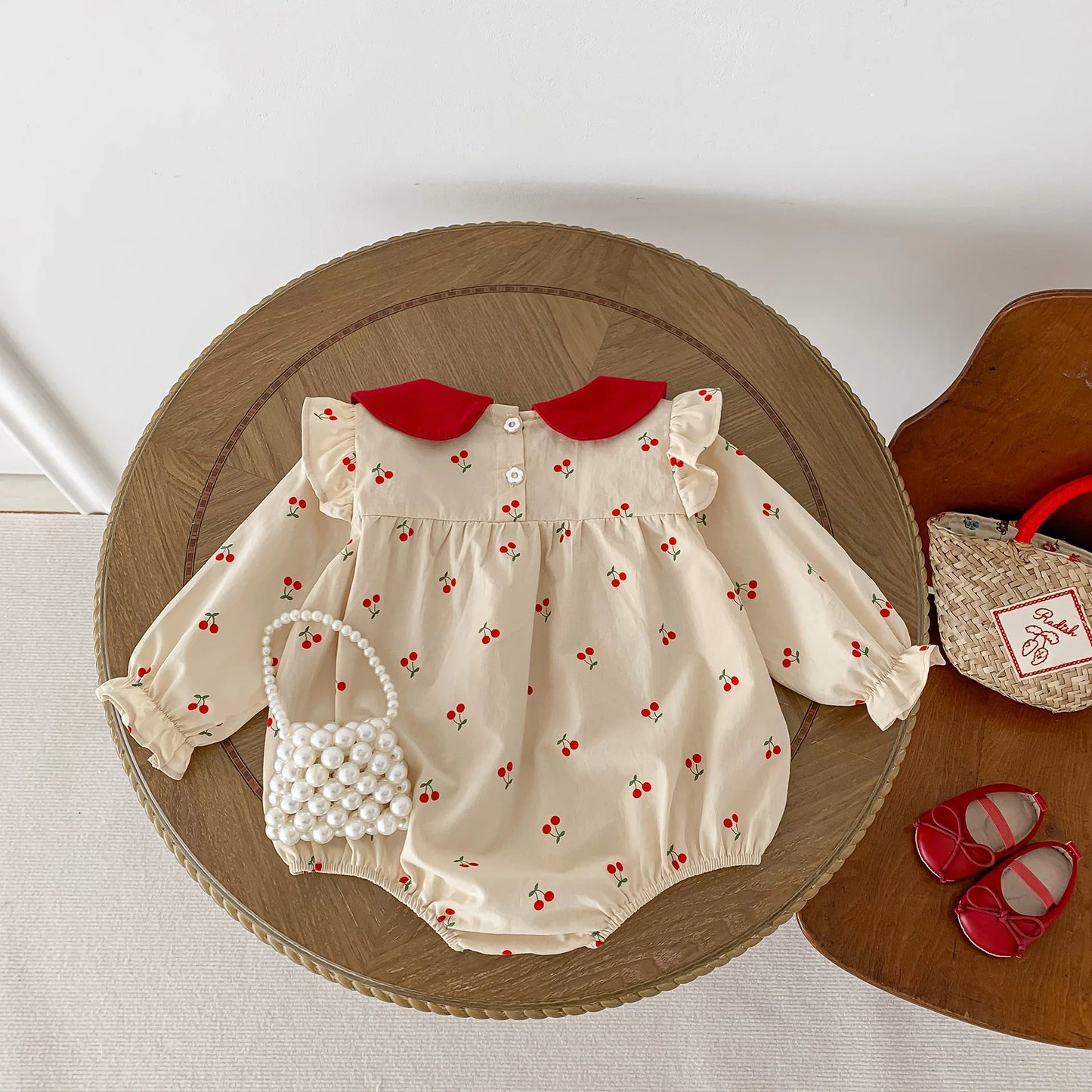 Precioso bombacho Vintage para bebé niña, enterito con cuello Peter Pan y estampado de cerezas para niñas pequeñas, Outfit de otoño invierno y de primavera verano para niñas