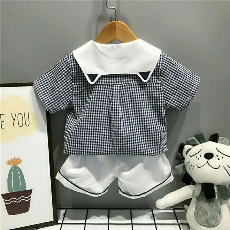 Conjunto de ropa de verano para hermanos estilo marinero sobre cuadros azules, niño y niña, Camisa en traje de dos piezas Vestido para niña