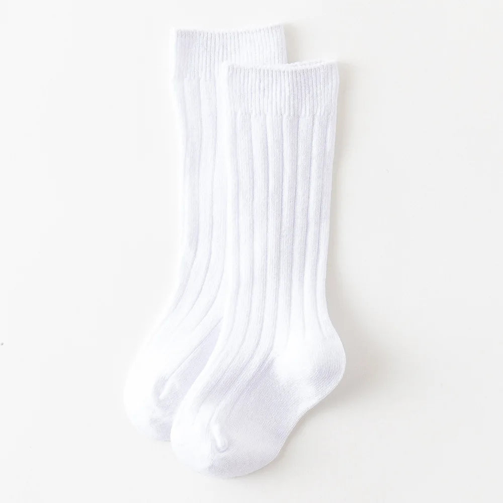 Nye solide sokker til knæet til babyer og piger, lange spray -bomuldssokker til børn, stribede sokker til skoleuniform til børn