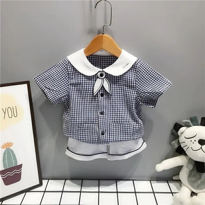 Conjunto de ropa de verano para hermanos estilo marinero sobre cuadros azules, niño y niña, Camisa en traje de dos piezas Vestido para niña